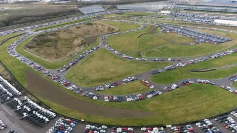 PA Media Cars stored at the Rockingham Motor Speedway circuit