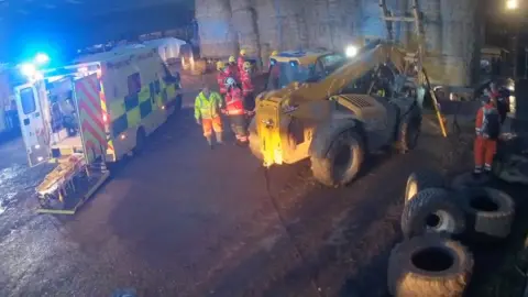 EAAA/Chris Taylor Emergency services freeing Jonathan Willis