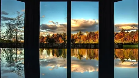 Paul Adams Reflection from window