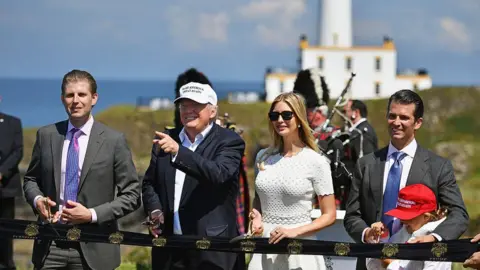 Getty Images Donald and family at the opening of Trump Turnberry