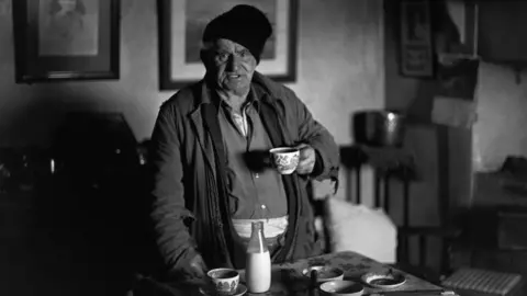 Digital scan, Beaford Arts Archie Parkhouse with a cup of tea in 1978