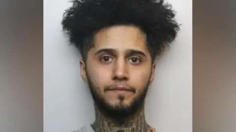 South Yorkshire Police A mugshot of Harwe.