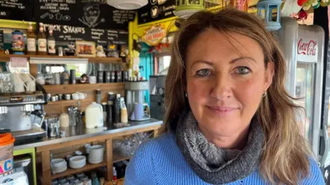 Andrew Turner/BBC Sandie Menezes in The Beach Hut Cafe