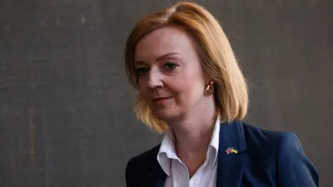 Reuters/HENRY NICHOLLS British Foreign Secretary Liz Truss leaves 10 Downing Street after the weekly cabinet meeting, in London, Britain May 17, 2022.