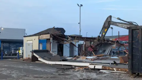 LDRS A building on an industrial estate being demolished 