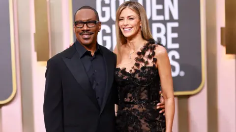 Getty Images Eddie Murphy and Paige Butcher