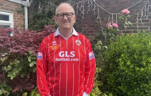 BBC/James Dunn Mick Fox at home in Crawley