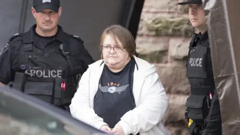 Getty Images Elizabeth Wettlaufer, a former nurse who pleaded guilty to the murder of eight elderly patients, at a courthouse in Woodstock, Ontario