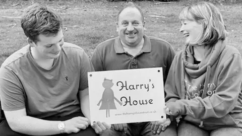 Shrewsbury and Telford Hospital Trust Harry's parents Stephen and Sally Johnson and his brother Eric