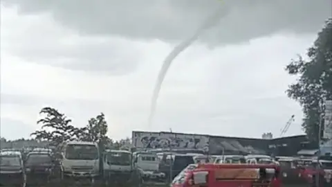 Waterspout off the Philippine coast seen from a distance