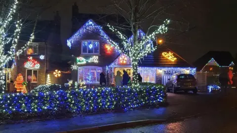 Photograph of a house with Xmas decorations on Wrenbury Drive in Rochdale