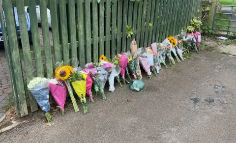 Floral tributes successful  a line