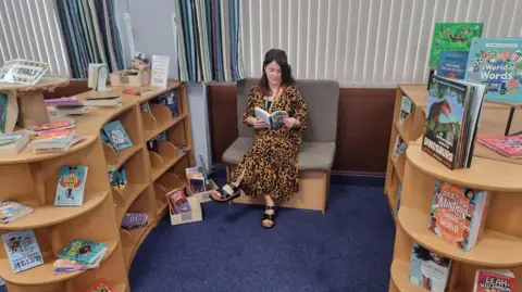 Imran Hafeez/Bradford Literacy Hub Laura Hughes, assistant headteacher at Carrwood Primary School in Holmewood, Bradford, enjoys the new library space.