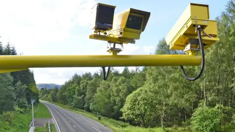 Aaron Sneddon Close up of speed cameras, suspended above the A9 road