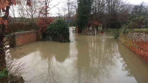Flood water in Hadleigh outside a resident's home