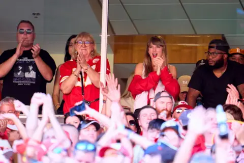 Getty Images Taylor Swift cheers from a suite with Donna Kelce as the Kansas City Chiefs play the Chicago Bears during the first half at GEHA Field at Arrowhead Stadium on September 24, 2023 in Kansas City, Missouri