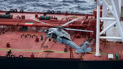 Footage posted by the Pentagon appears to show troops boarding the tanker by helicopter