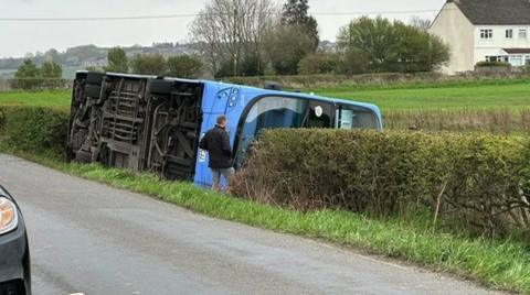 Bus on its side