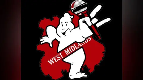 West Midlands Ghostbusters The Ghostbusters logo depicts a white ghost climbing through a red no entry sign. The ghost is holding a microphone. The red no entry sign says 'West Midlands'.