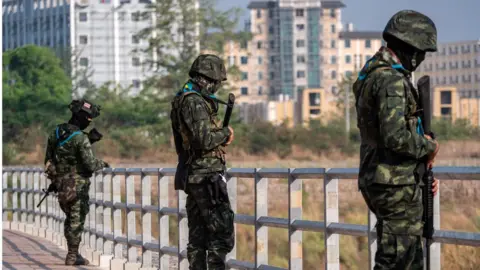 BBC/Jonathan Head Thai army stand guard by 2nd friendship bridge following the fall of a strategic border town Myawaddy to rebels