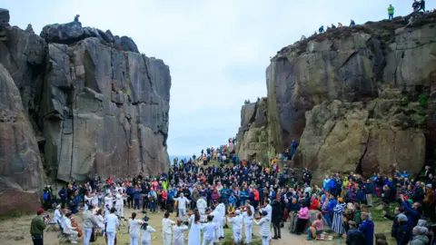 Bradford Progress Lots of people gathered at the Cow and Calf rocks in Ilkley