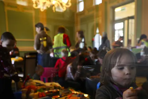 Getty Images An area has been set up for children in the train station