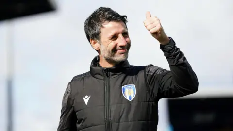 Danny Cowley giving the crowd a thumbs-up