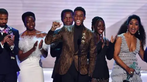 AFP Chadwick Boseman, Michael B. Jordan, Danai Gurira, Lupita Nyong"o and Angela Bassett accept the award for best Cast In A Motion Picture for Black Panther at the 25th Annual Screen Actors Guild Awards