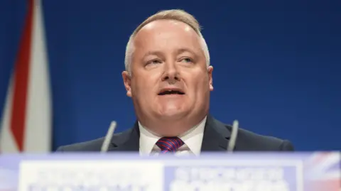 PA Media Darren Millar speaking at a Welsh Conservative conference