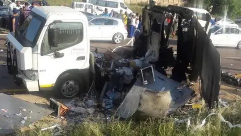SAPS A partially destroyed cash-in-transit van in South Africa
