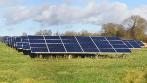 File photo of a number of solar panels in a field