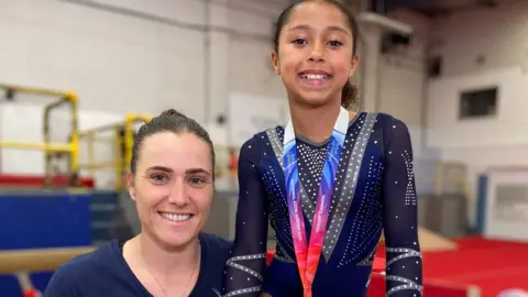 Tyliyah Shannon-Gray with her coach Jemma Wilson