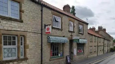 A Google Street View image of the Post Office in Helmsley 