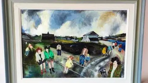 A painting of people walking in ones or twos around Penlee Park, with an expanse of water to the right, with some low storey buildings in view. The sky is full of clouds. In the foreground there is a woman with a bright green jacket and dark hair, walking with another woman in a black dress and white jacket.