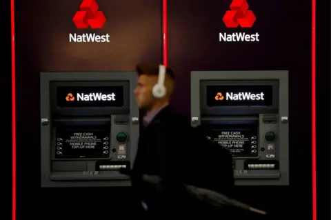 Reuters NatWest bank cash machines