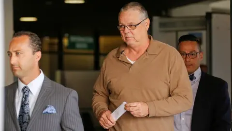 Reuters Scot Peterson leaves Broward County Jail with his attorneys Joseph DiRuzzo and David Sobel on 6 June