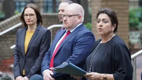 Jonathan Brady/PA Media Det Ch Insp Iain Moor and Jaswant Narwal