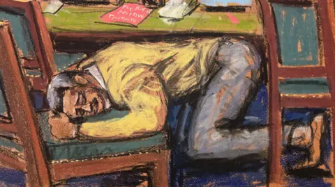 Court sketch of Sean Diddy Combs kneeling on the floor with his head in a chair after learning verdict