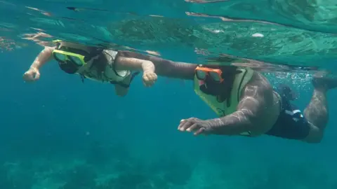 SWNS Pitter family snorkelling