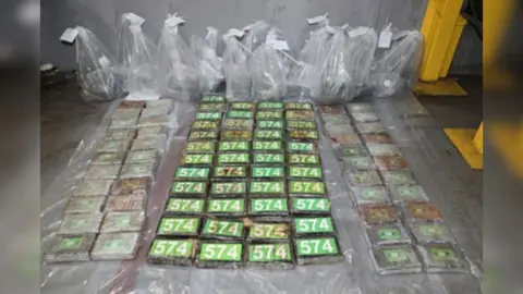NCA Numerous green parcels of cocaine, with clear plastic bags