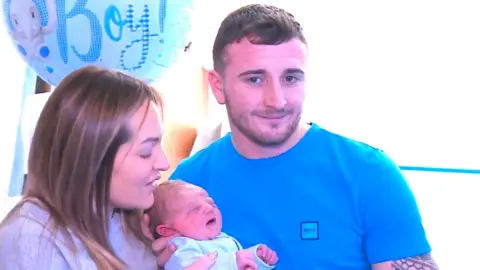 BBC Emma Allan, Cameron Cunningham, and baby