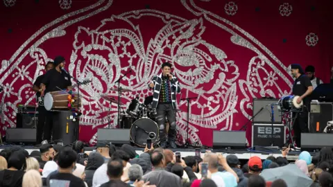 SNS Mela performers on stage