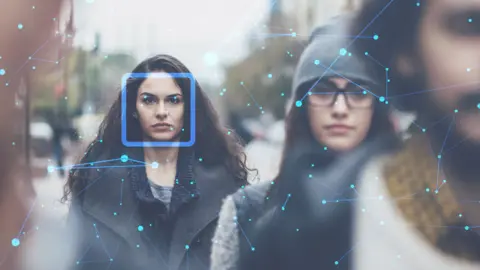 Getty Images Woman with facial recognition marks