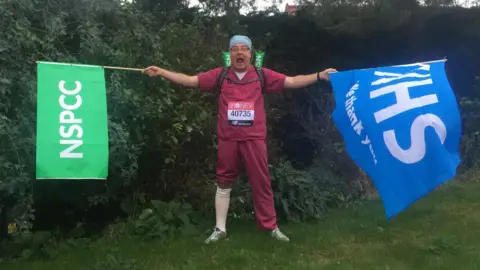 PA Media Simon Gallo ahead of doing the virtual London Marathon in 2020