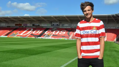 PA Louis Tomlinson