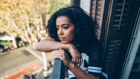 Getty Images a woman looking lonely