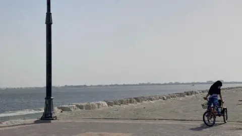 Sebastian Usher Girl on tricycle