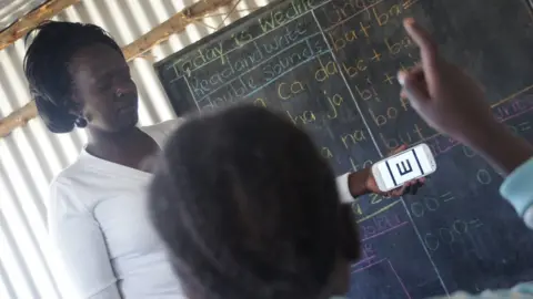 Peek vision picture of children and teachers using the app