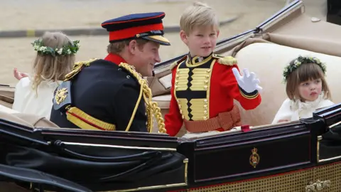 Getty Images Prince Harry with pageboy Tom Pettifer and bridesmaid Eliza Lopes, right