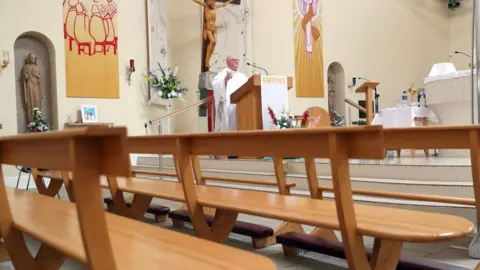 PAcemaker A priest performing his sermon to an empty church